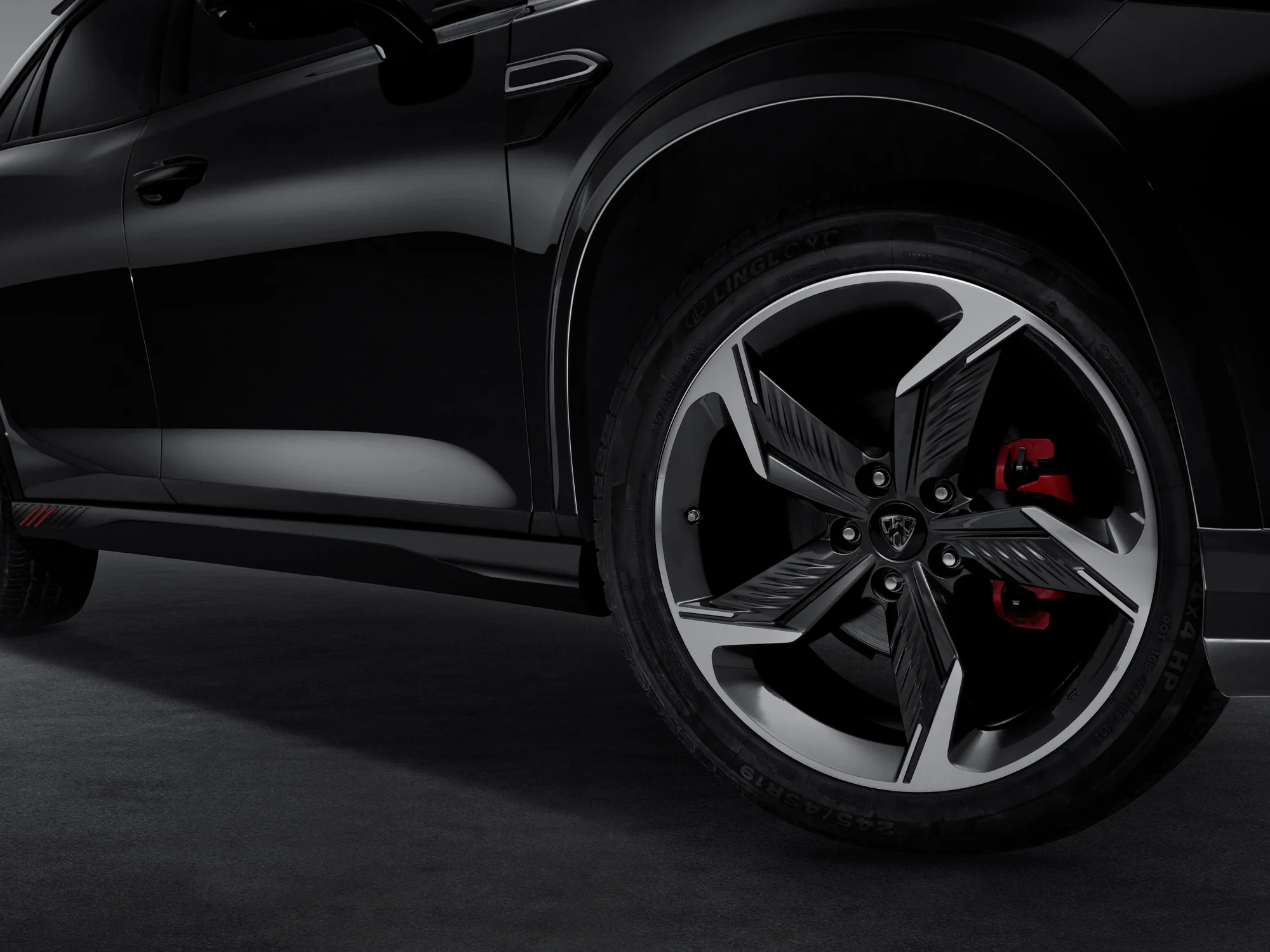 19-inch wheel of the black ABADAL NOVO with a red brake caliper
